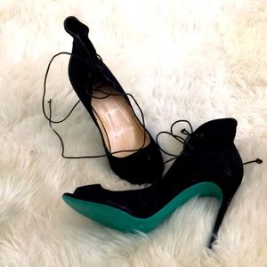 Authentic one of a kind Louboutins by the artist.